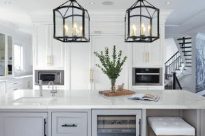 beautiful kitchens - white kitchen cabinets with golden trim and custom wall mural