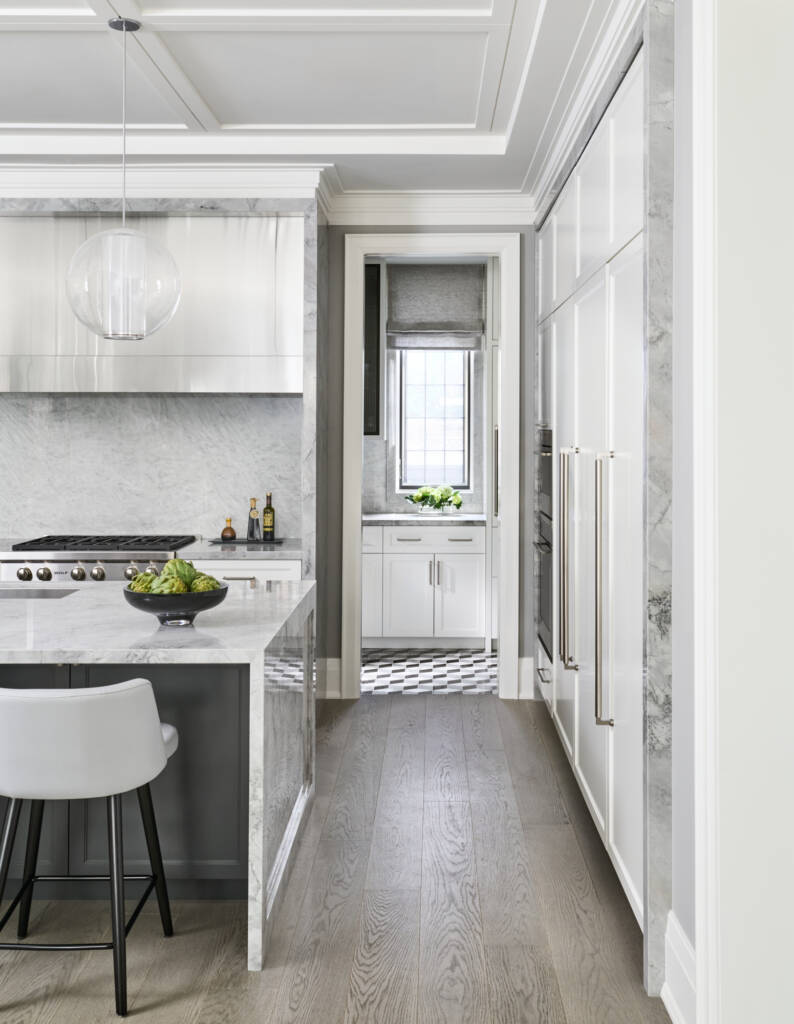 kitchen hallway, marble countertop, white counter across door in the back